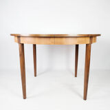 Dining table in teak with extensions, of Danish design from the 1960s.