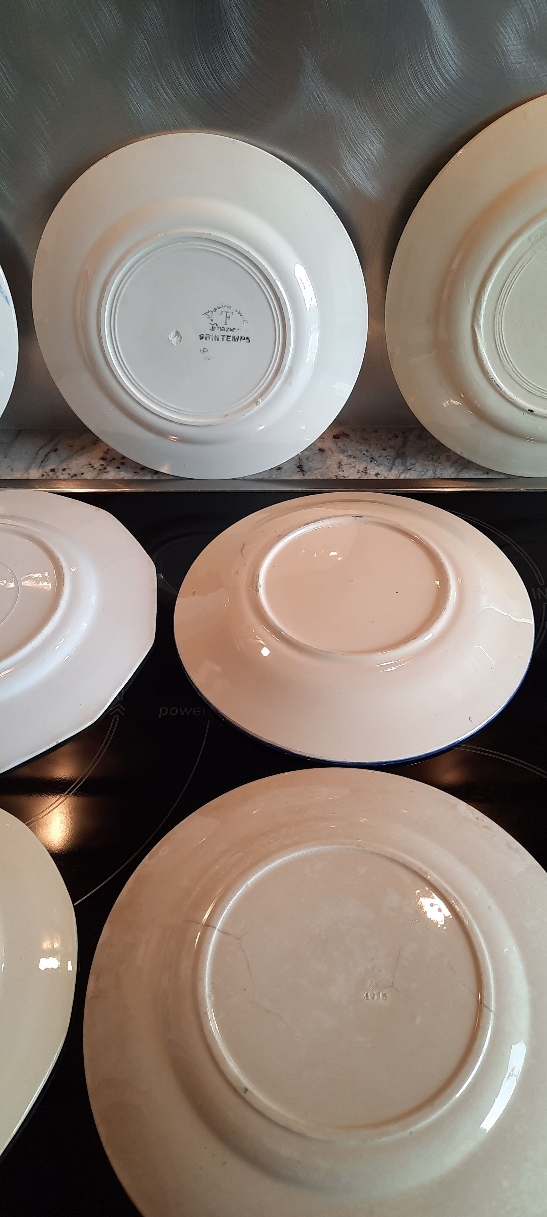 Old flat faience plates