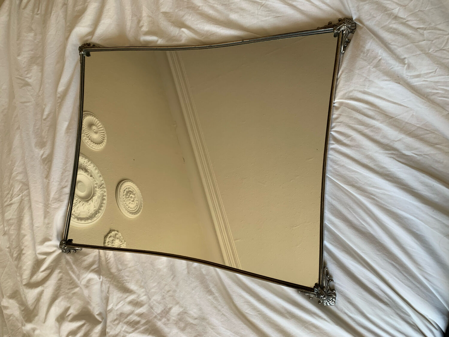 Silver metal mirror curved edge