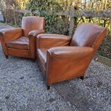 A couple of pairs of genuine restored club armchairs in industrial loft leather.