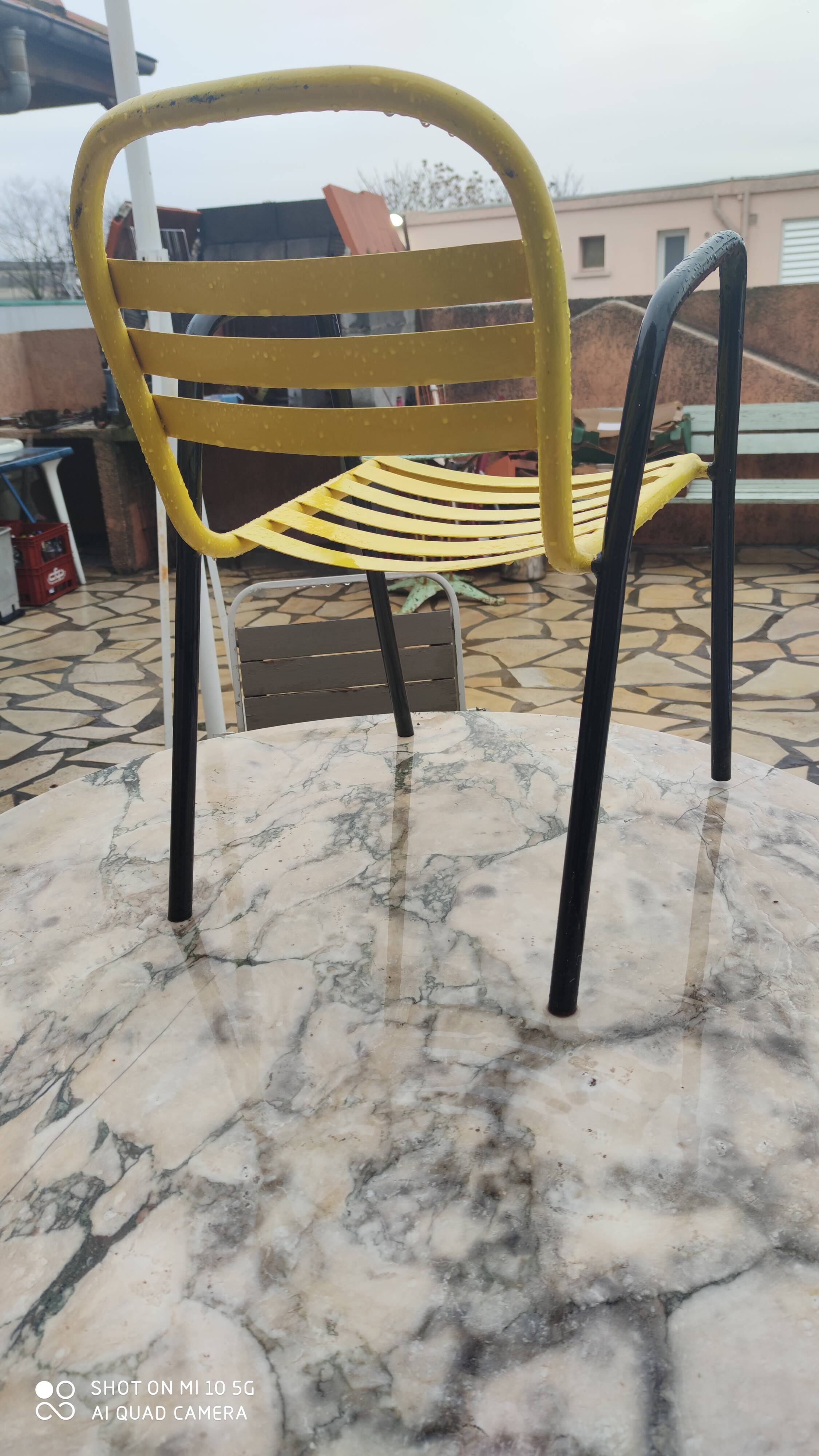 Armchair in black and yellow painted steel, circa 1950, in the style of Mallet-Stevens