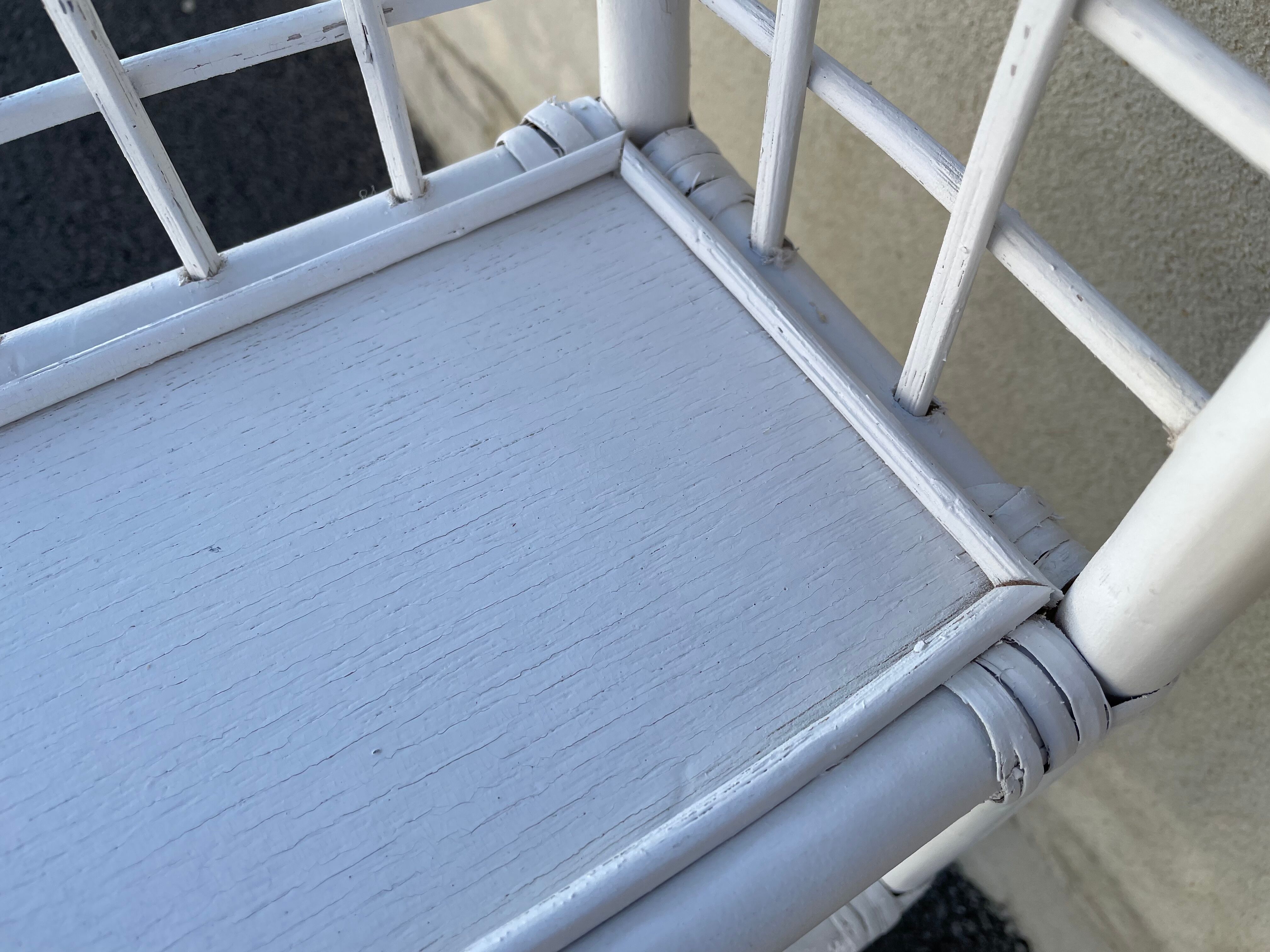 White rattan shelf with braces