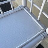 White rattan shelf with braces