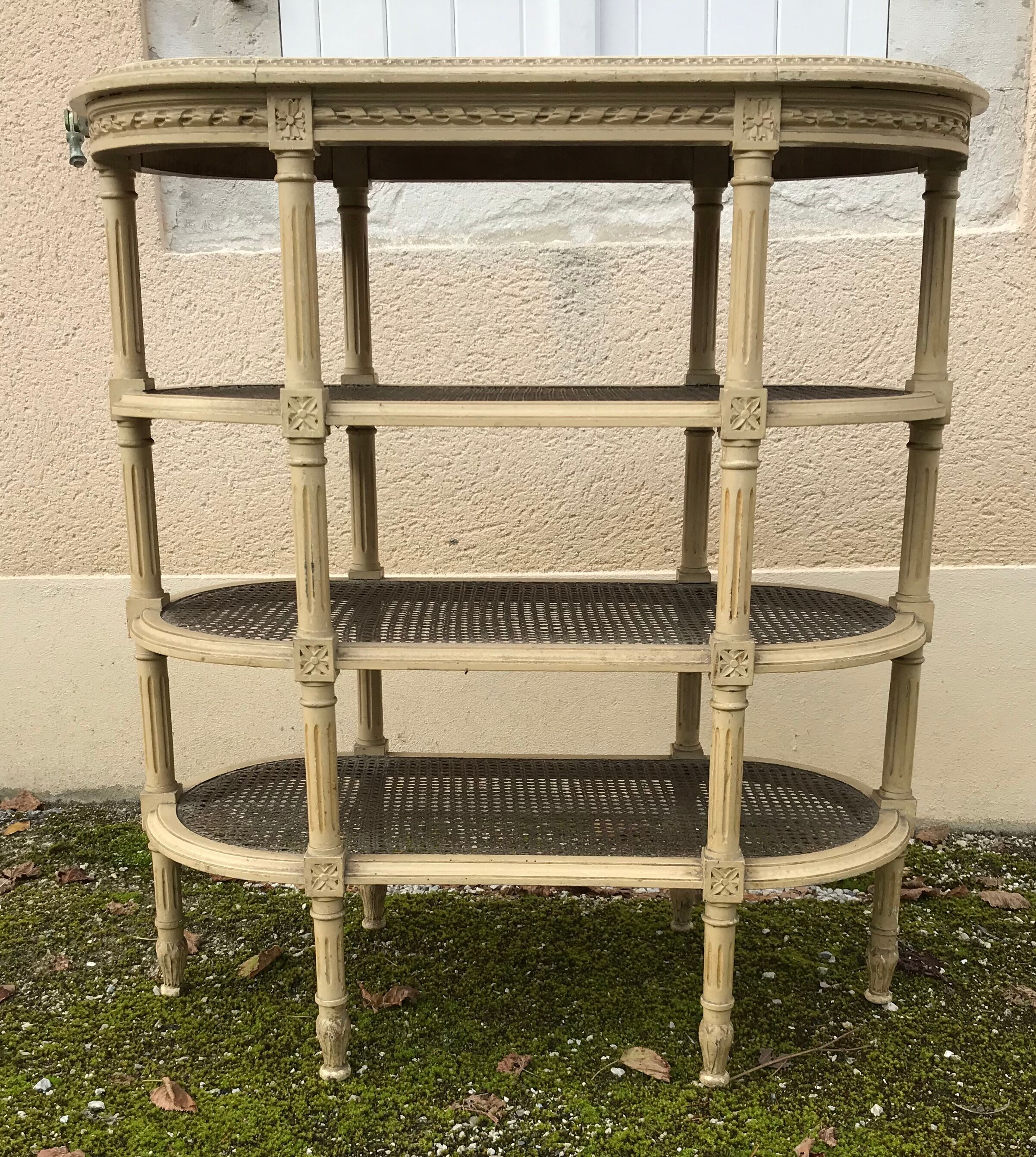 Wooden saddle on three shelves