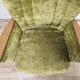 Deux fauteuils cocktail en tissu vert des années 1950 à roulettes
