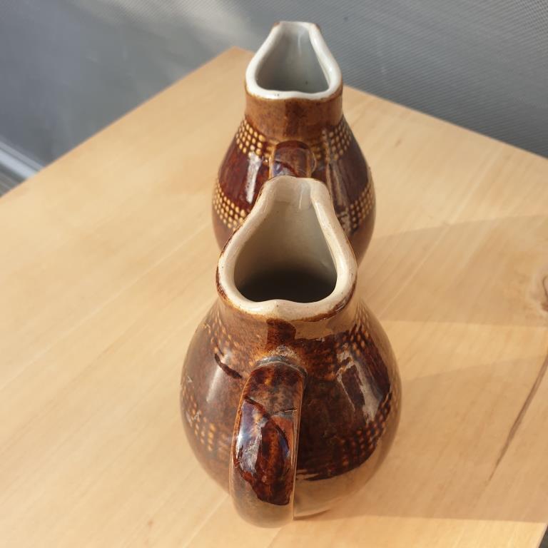 Pair of Renault sandstone pitchers pourers of the 7 dwarfs