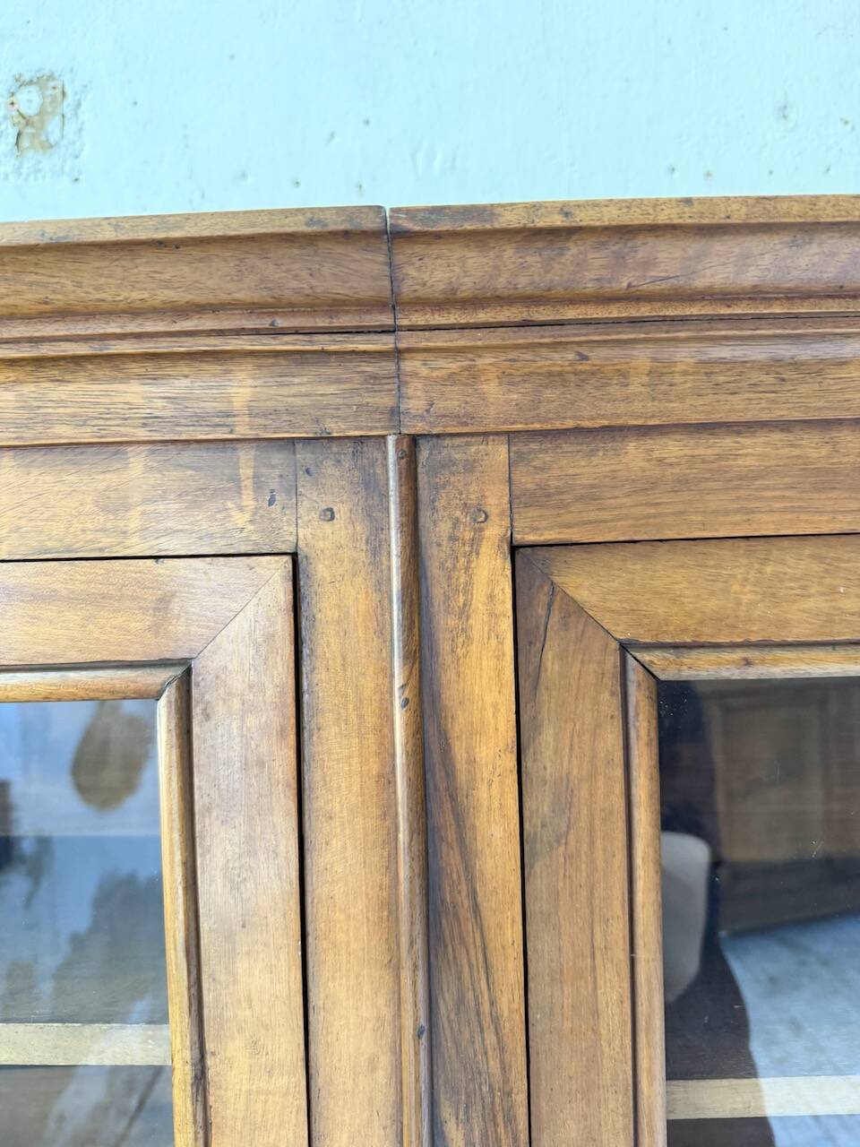 Glass-fronted walnut library 1900