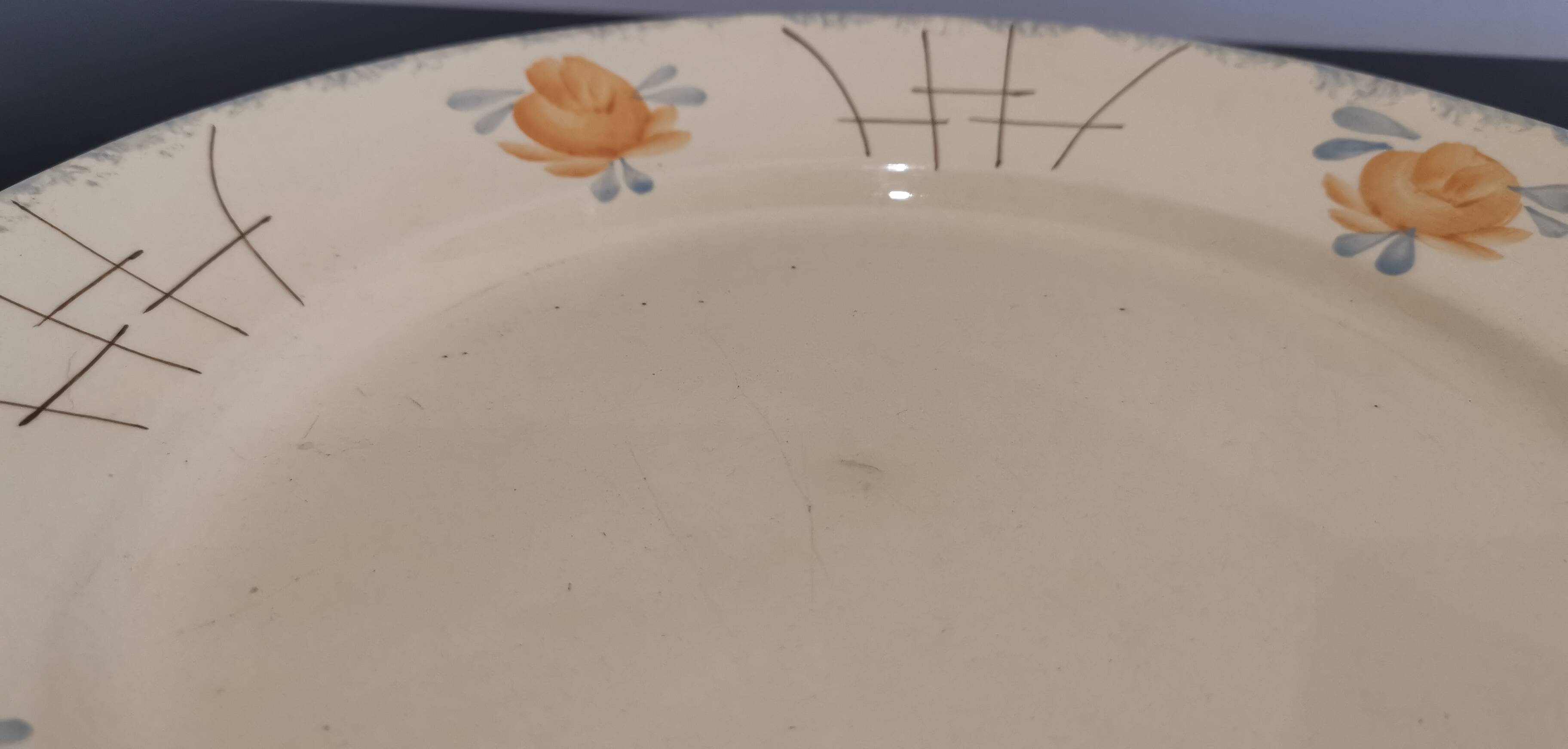 Old Terre de fer earthenware dish, hand painted
