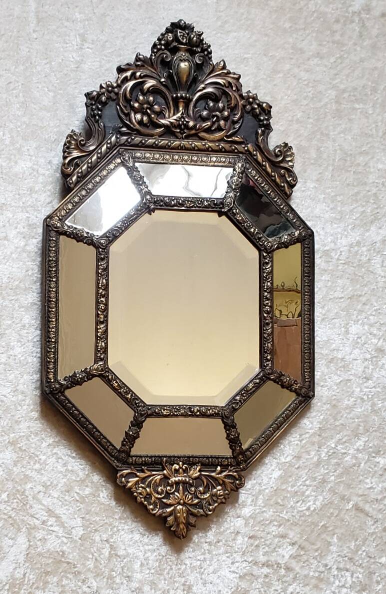 Old octagonal mirror with brass glazing beads