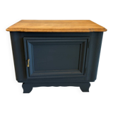 Mat black storage furniture, natural top.