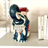 Blue and red ceramic elephant plant stand