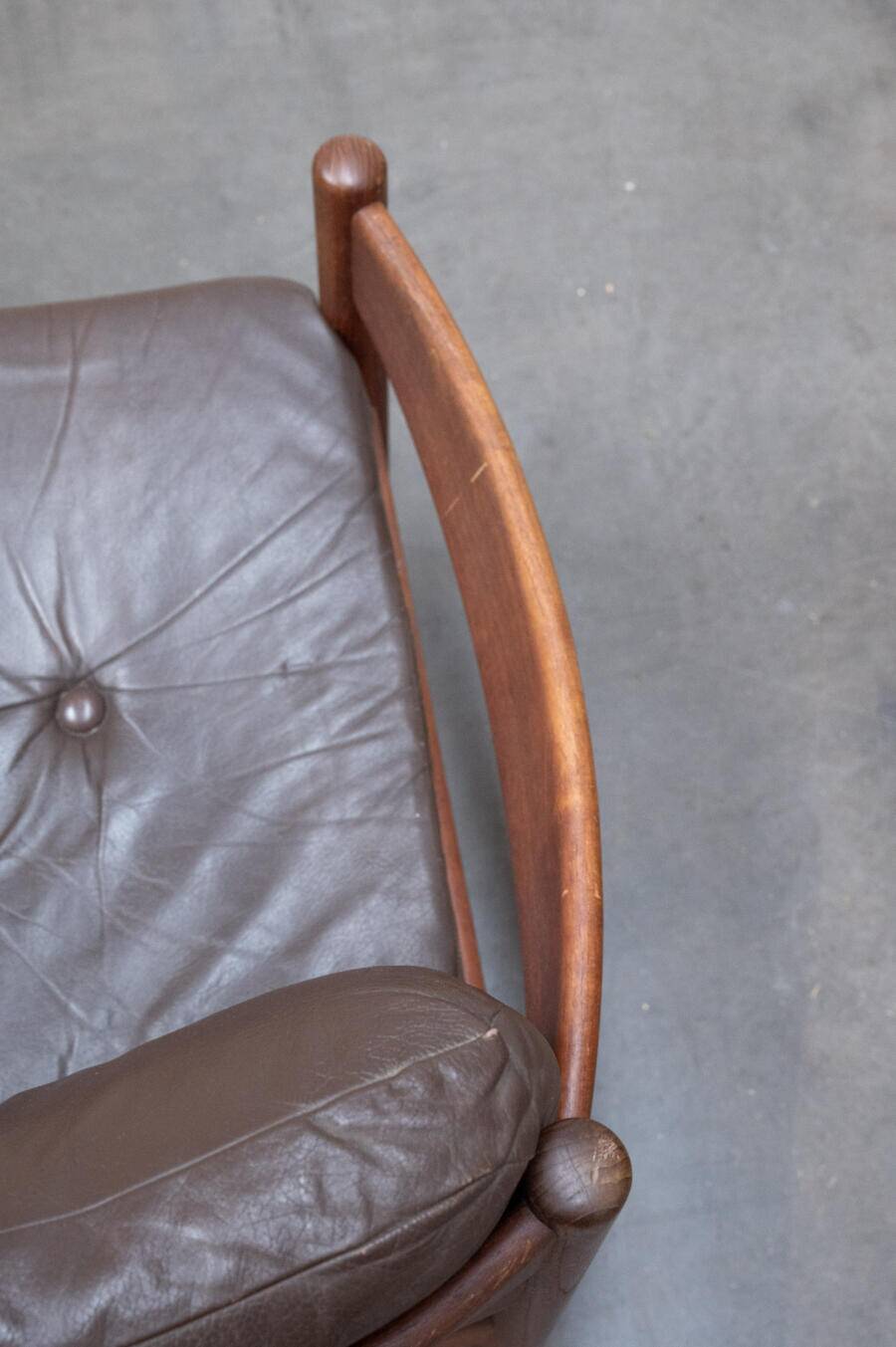 Teak and leather armchair