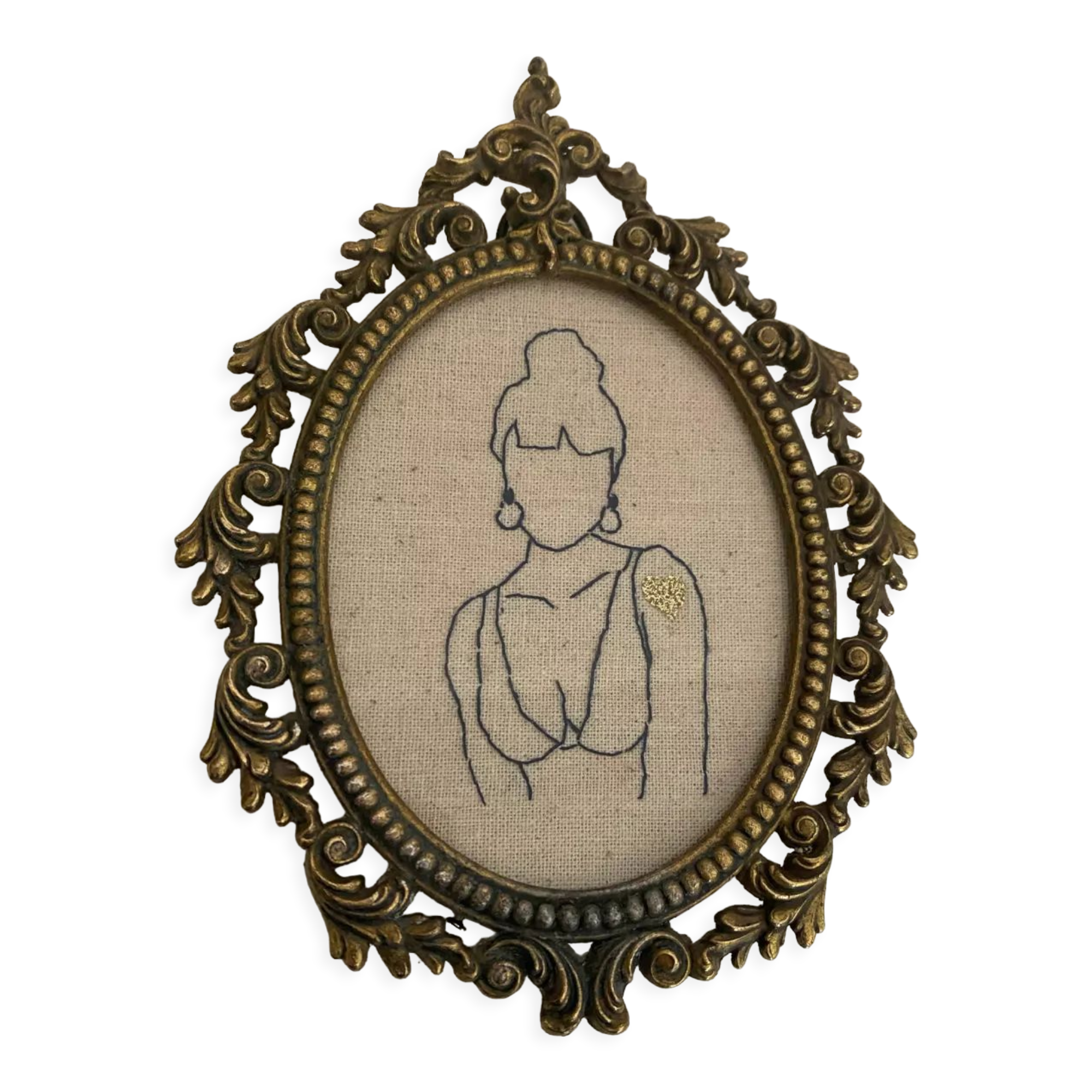 Broderie encadrée