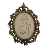 Broderie encadrée