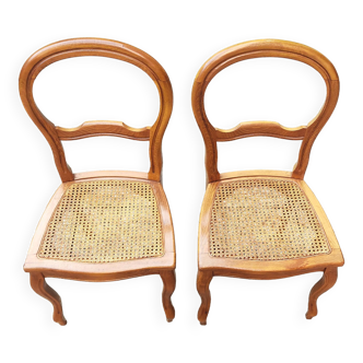 Pair of caned walnut chairs, Louis Philippe style