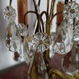 Pair of bronze girandoles with crystal pendants, two arms of lights.