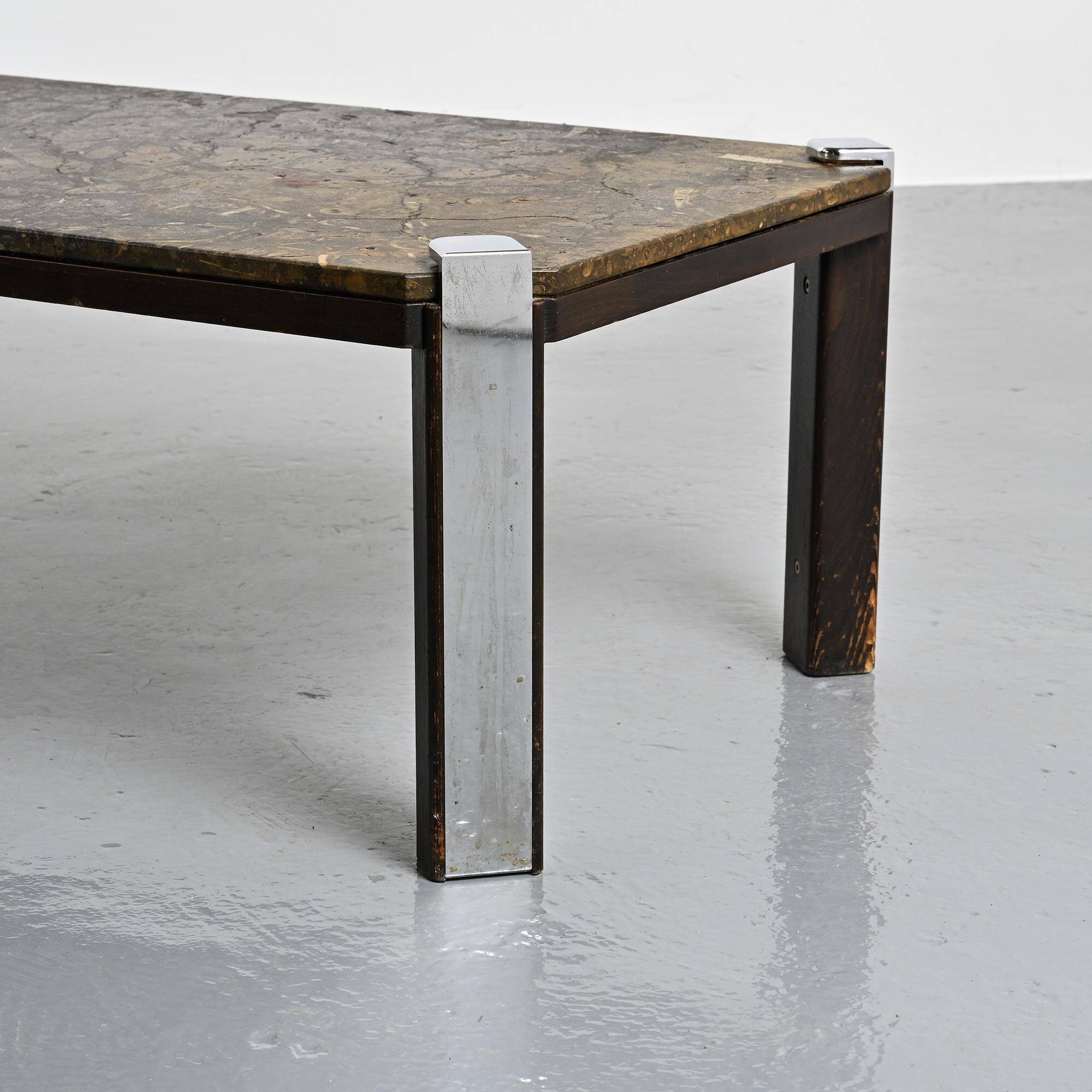 Fossil stone and chrome metal coffee table, Fossile Collection, Switzerland, circa 1980.