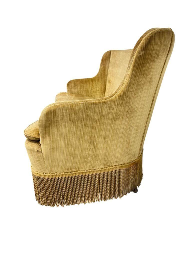 Vintage mustard yellow two-seater sofa with fringe