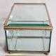 Jewelry box in bevelled glass and gold metal