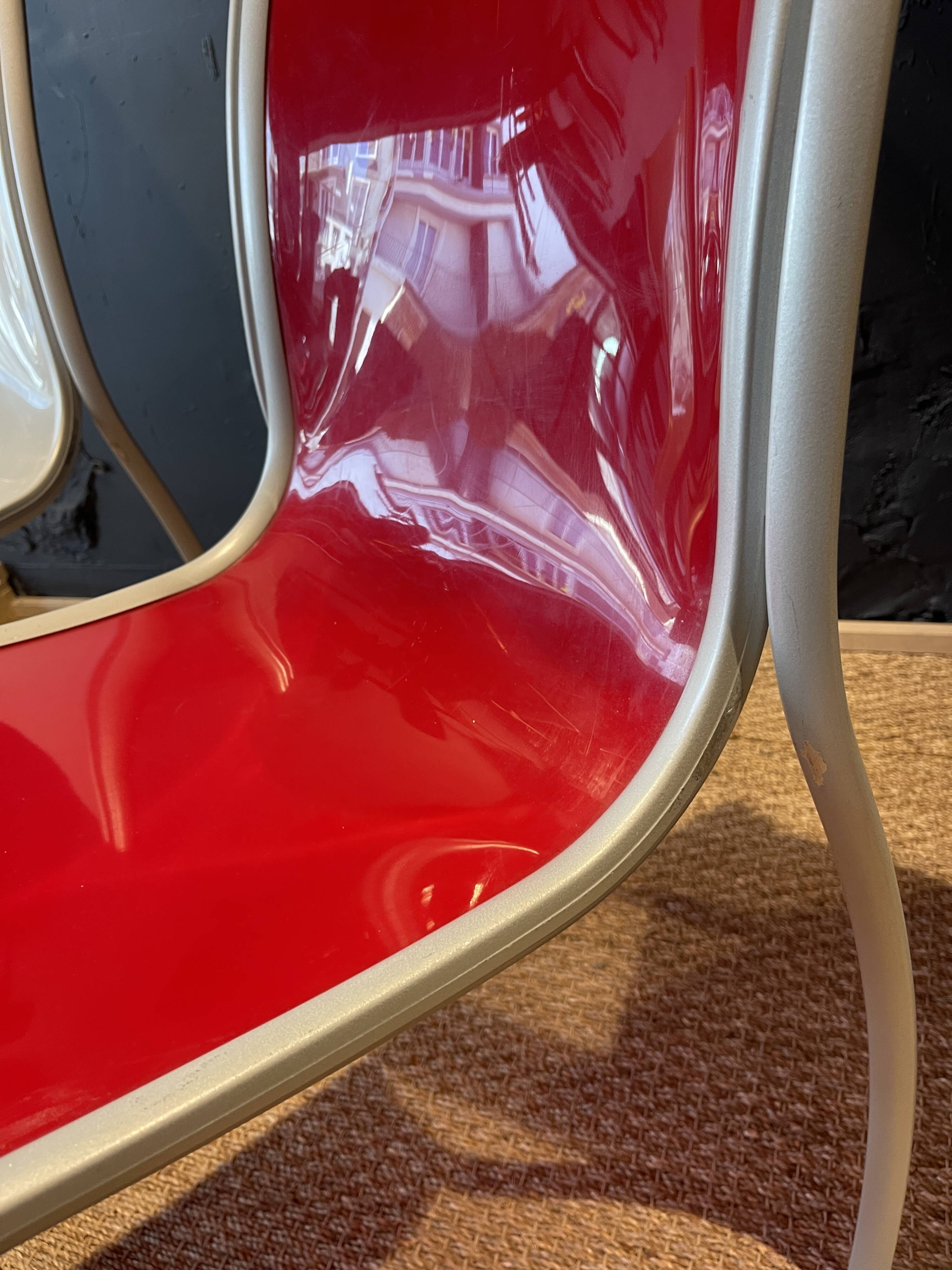 Pair of FPE chairs by Ron Arad for Kartell translucent and red Italy