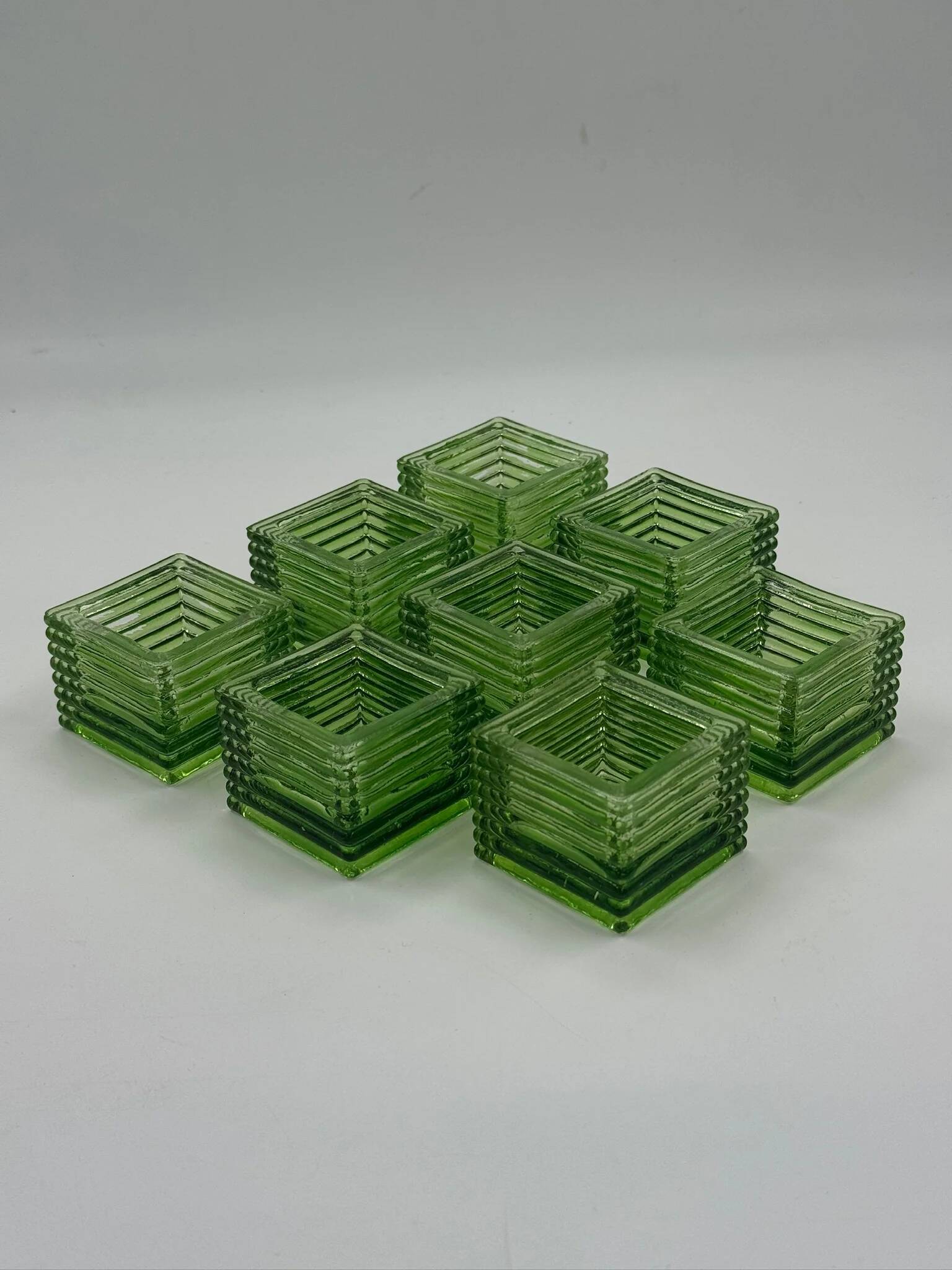 Set of 8 vintage green pressed glass candle holders