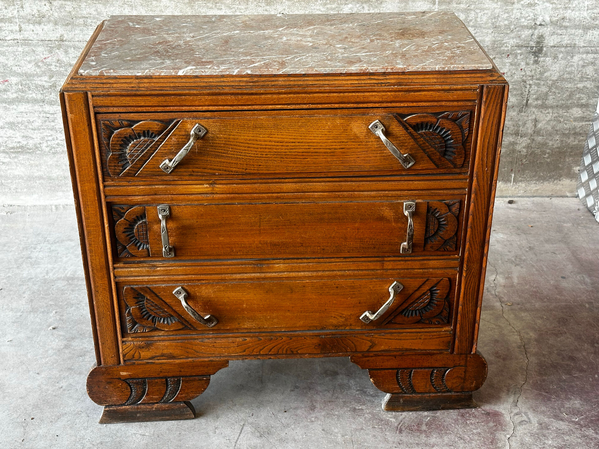 Compact Art Deco commode from the 1930s, carved wood and marble.