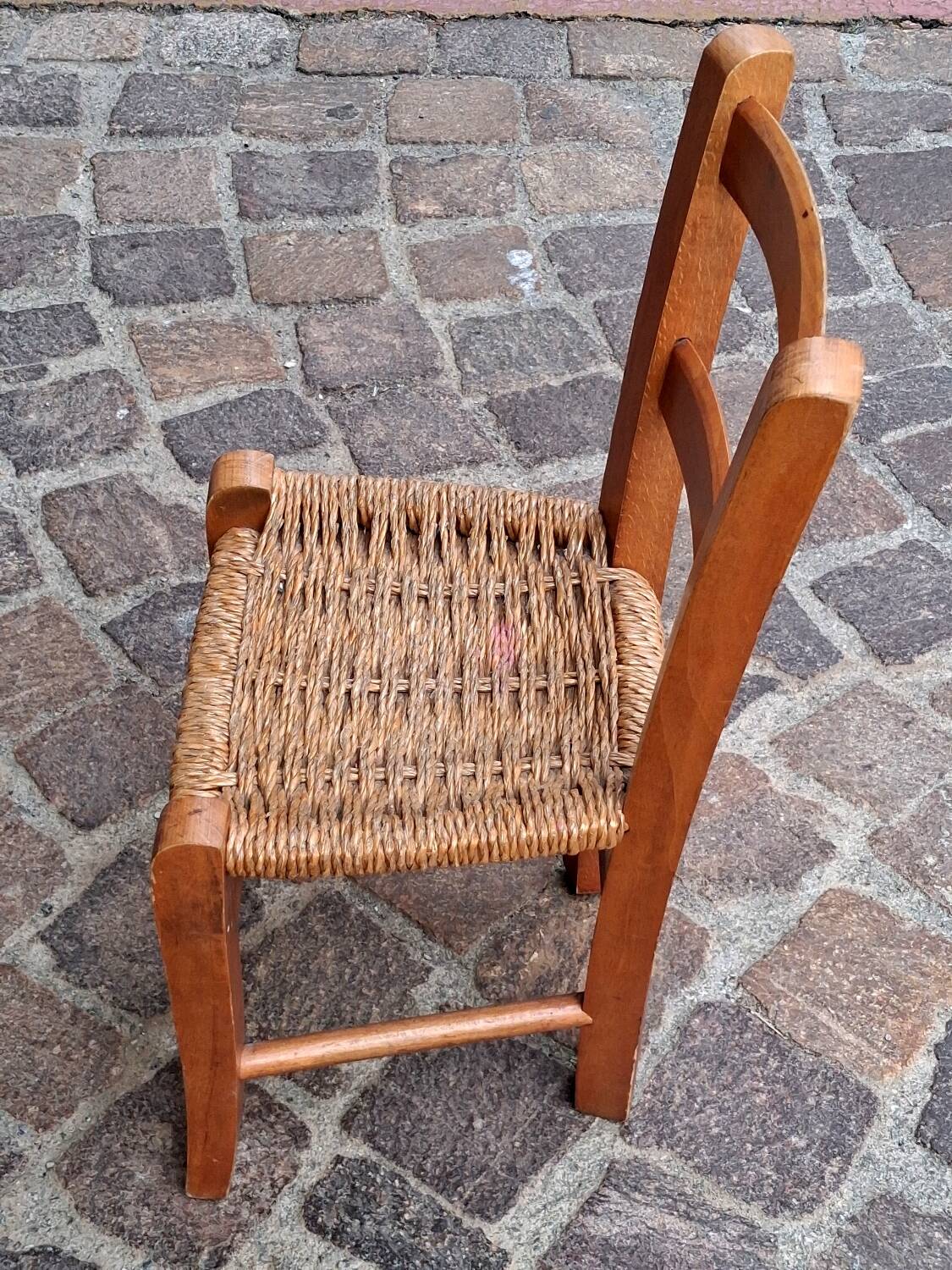 Small chair for children, folk art, wood and straw.