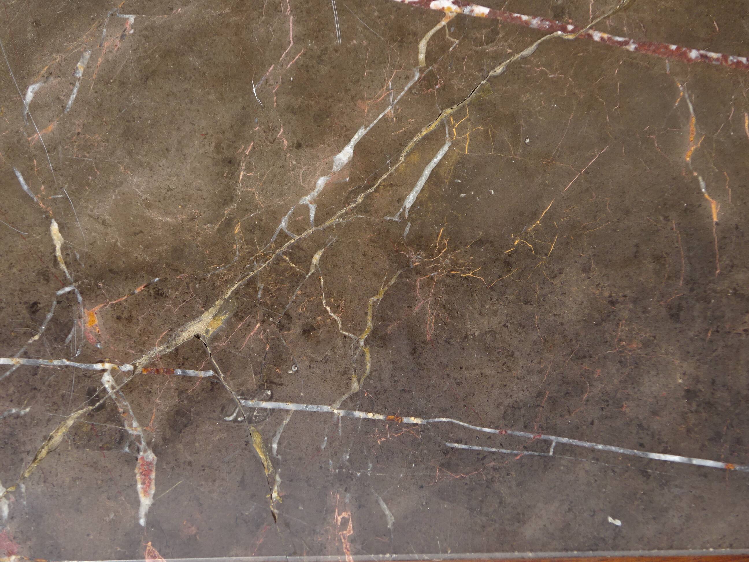 Solid walnut sideboard, moustache legs, black marble top.