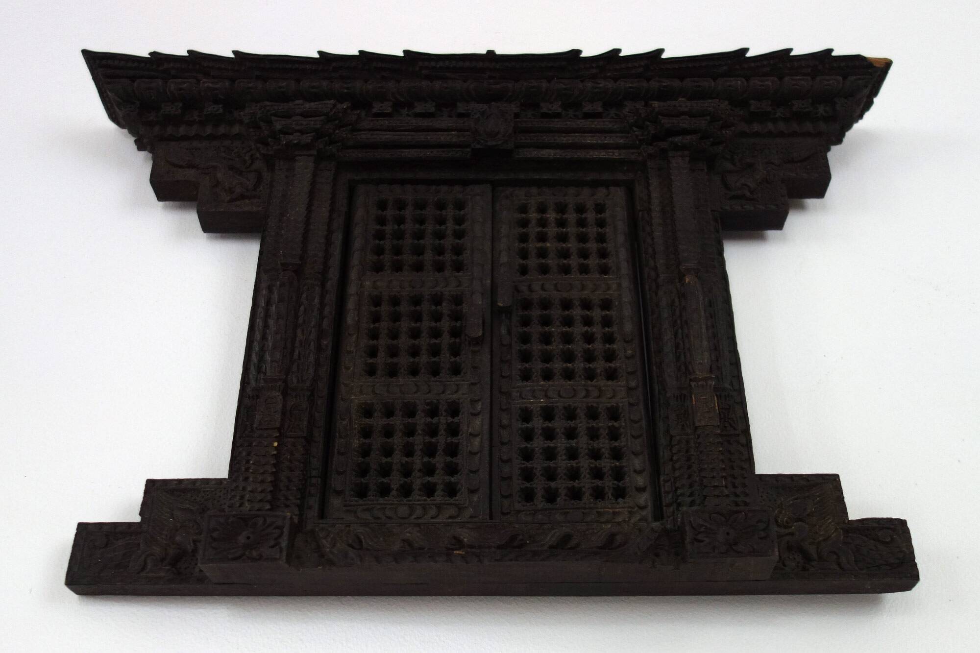 Old Newari Nepali window in carved wood