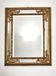 Large Italian gold mirror in wood with bevelled glass.