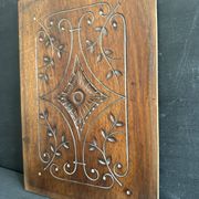 Pair of antique decorative panels in carved wood, late 19th century.