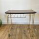 Rolling table vinyl row in formica and gold metal years 60-70