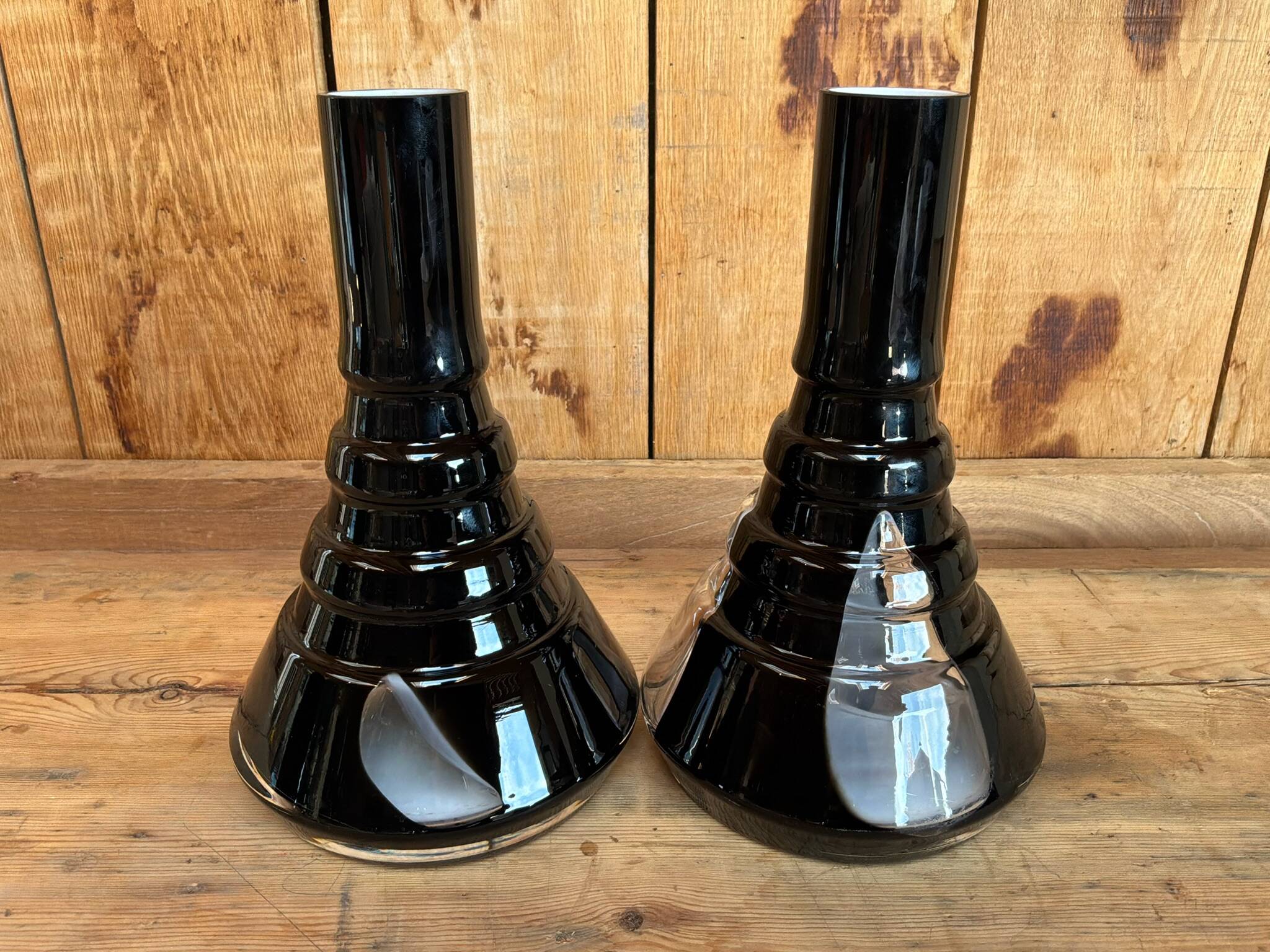 Pair of black and opaline multilayer glass vases. 1970s.