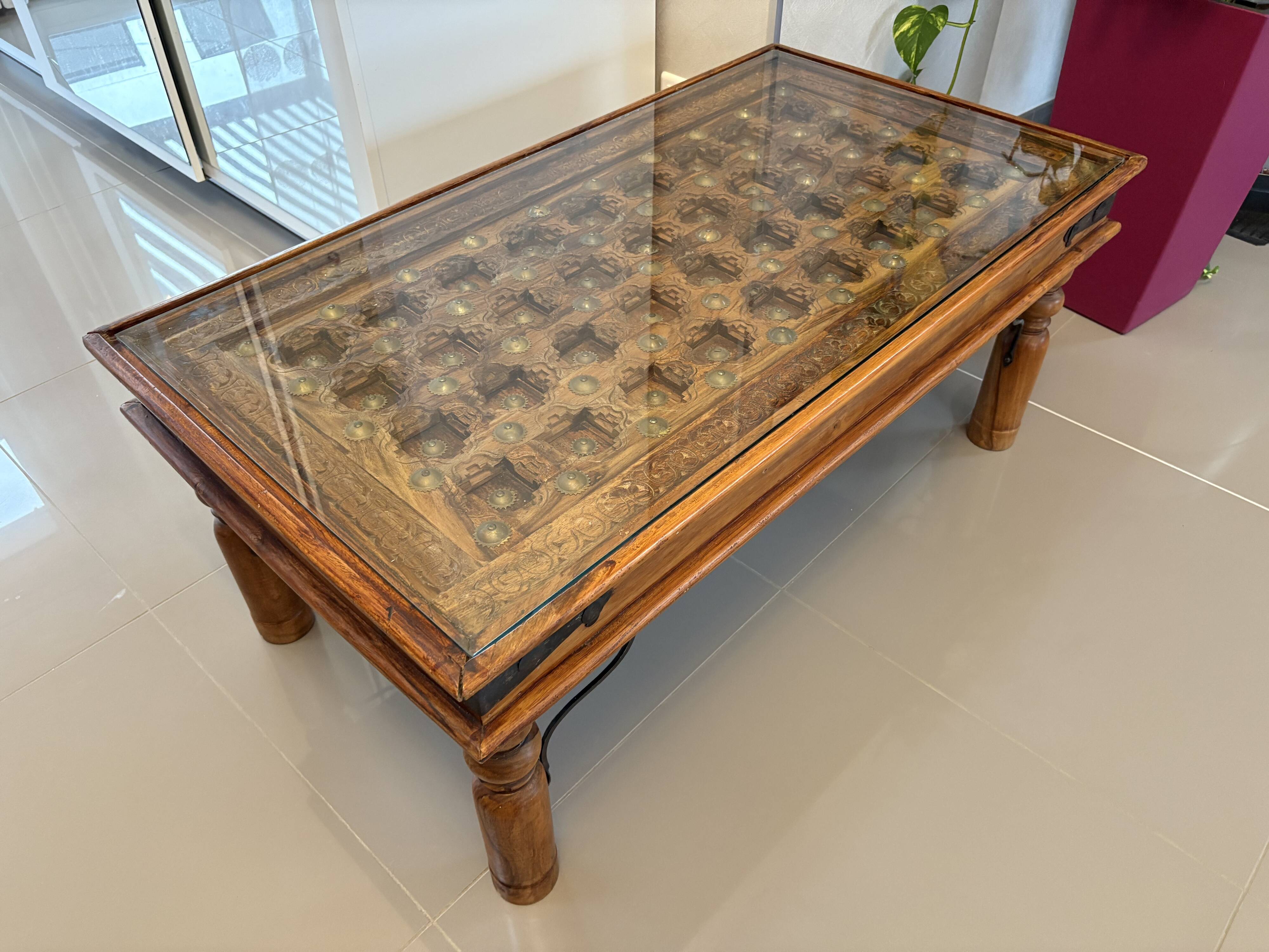 Solid oak carved coffee table with glass top