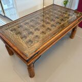 Solid oak carved coffee table with glass top