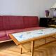Mosaic coffee table, teak and straw, created by designer Paul Jensen.