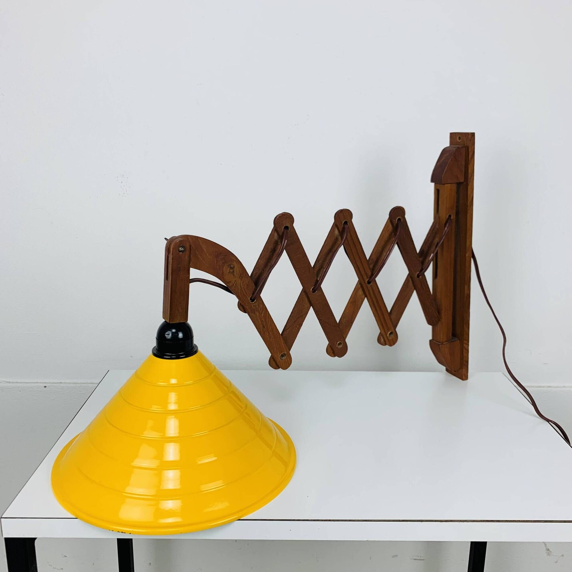 Scandinavian accordion wall light from the 60s, wood and yellow reflector