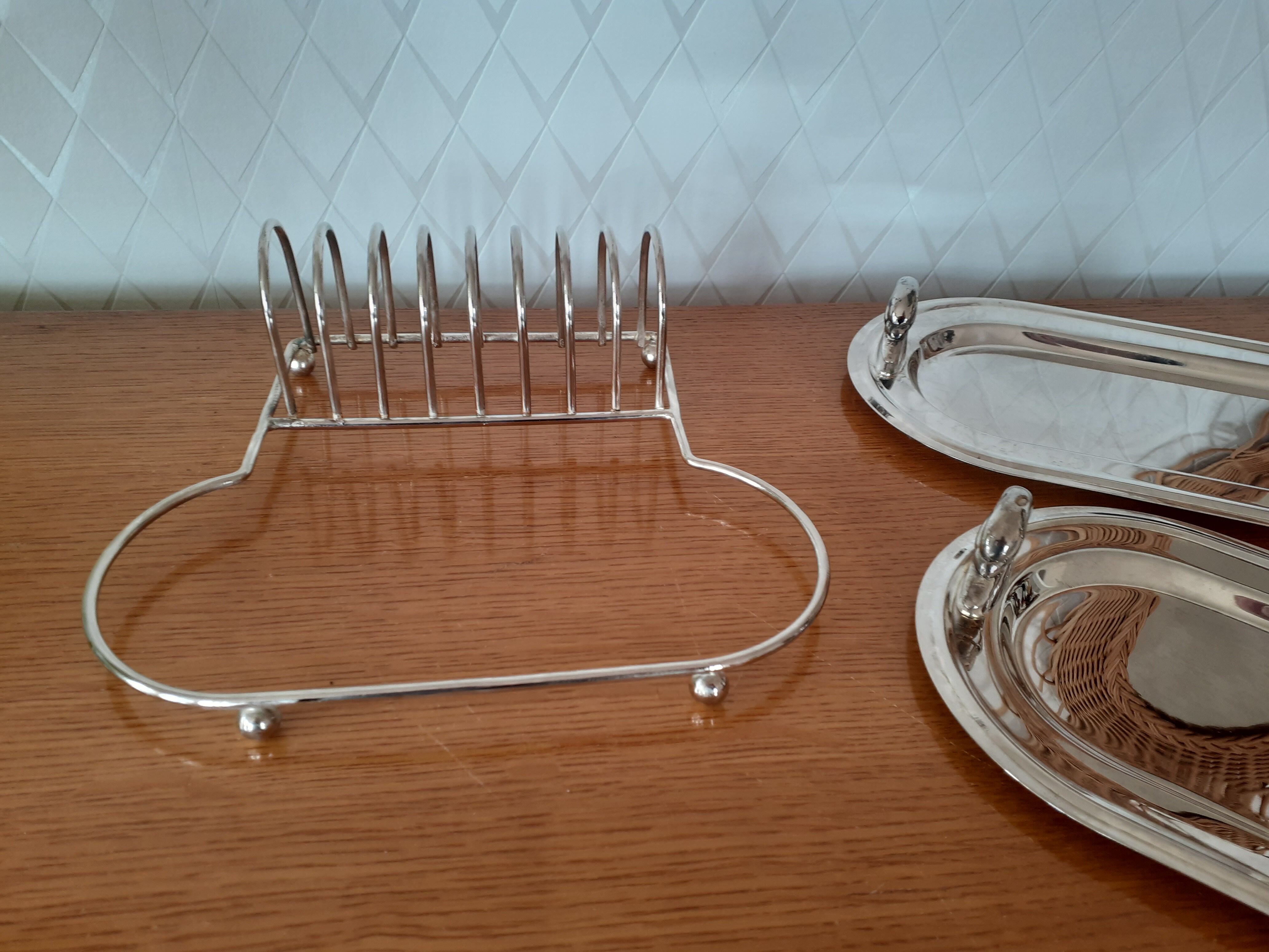 Two foie gras dishes and their toast holder