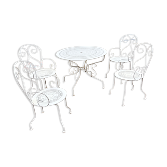 Old wrought iron garden furniture with 4 armchairs