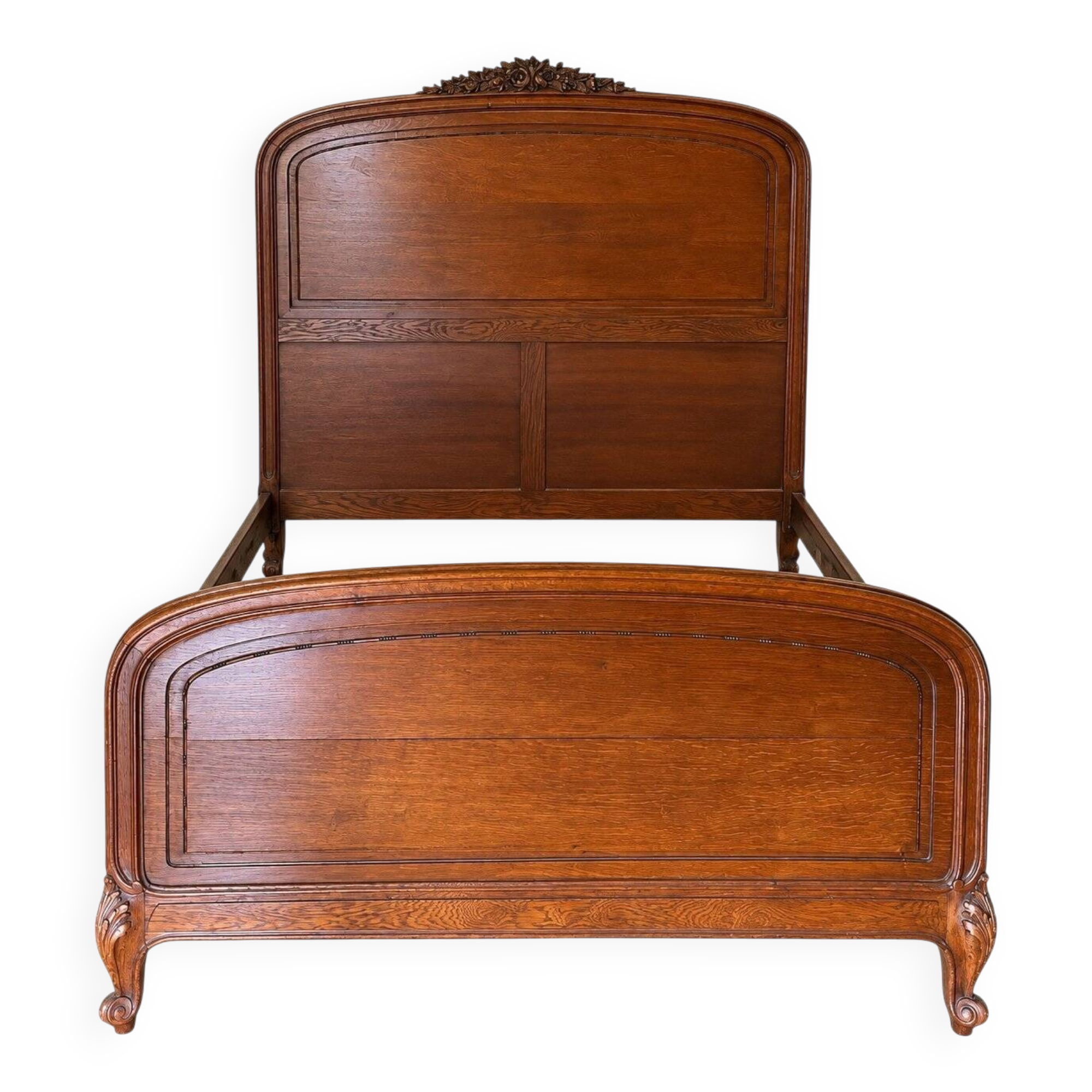Double bed Louis XV carved walnut with roses and cabriole legs.