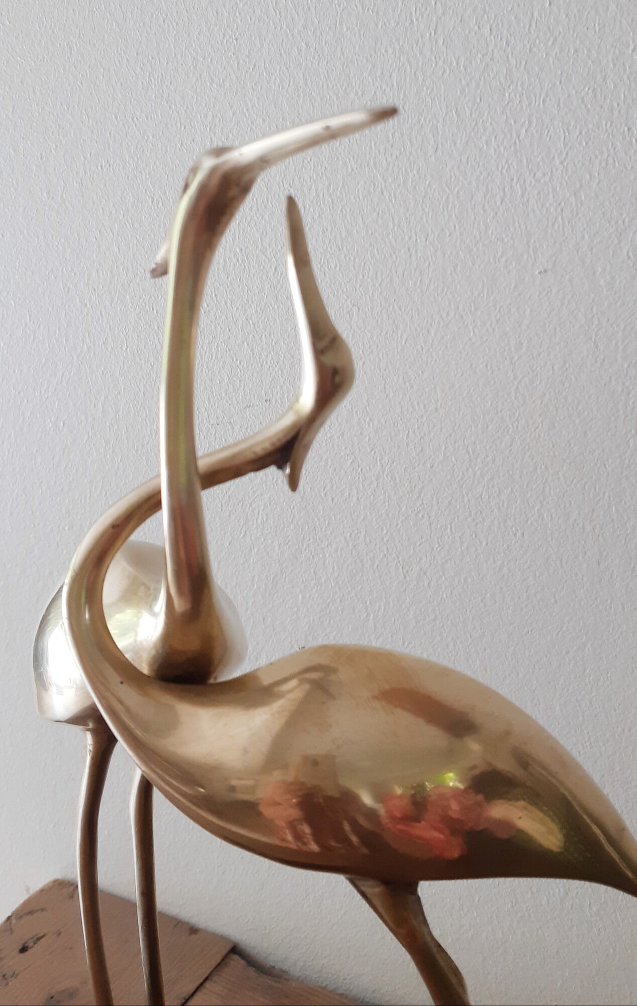 Couple of wading birds in brass on wooden base