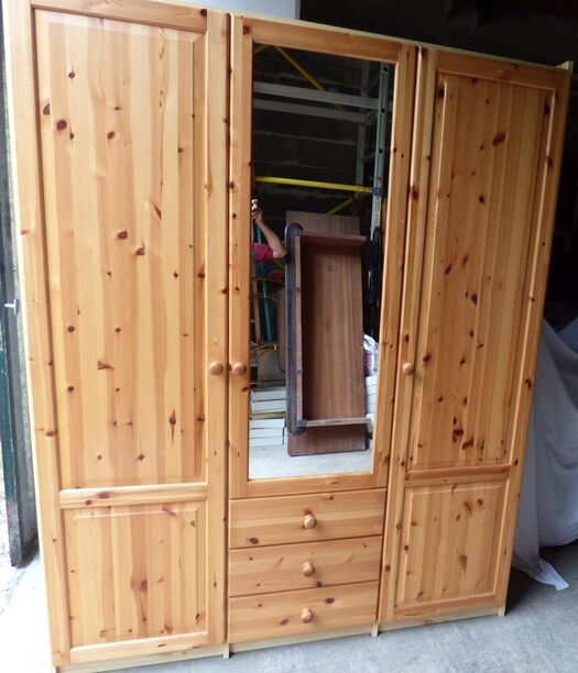 Wardrobe three doors, one with mirror, three drawers in solid pine wood
