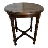 Antique turned wooden side table with authentic charm.