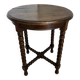 Antique turned wooden side table with authentic charm.