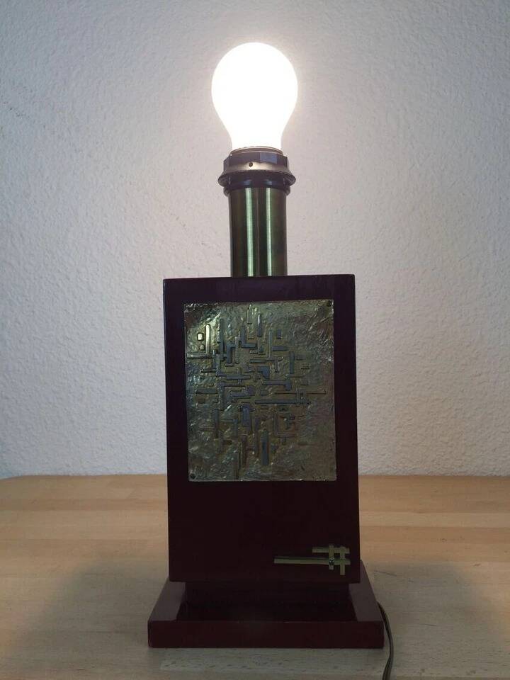 1980s vintage lamp base in red wood and gold metal.