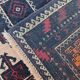 Vintage Persian Baluch rug, hand-knotted wool, 1970.