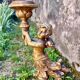 Pair of large candlesticks with cherubs