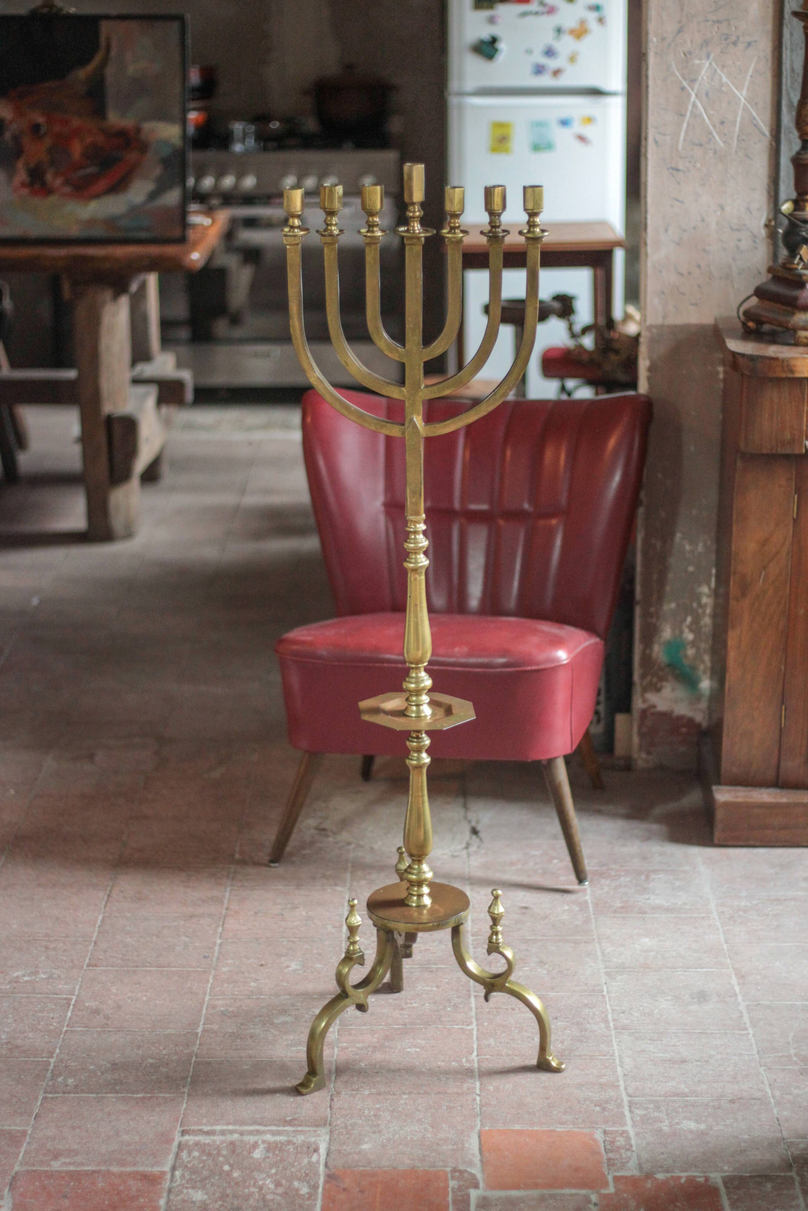 Golden bronze chandelier with seven arms, Menorah, candlestick on a stand, candelabrum.