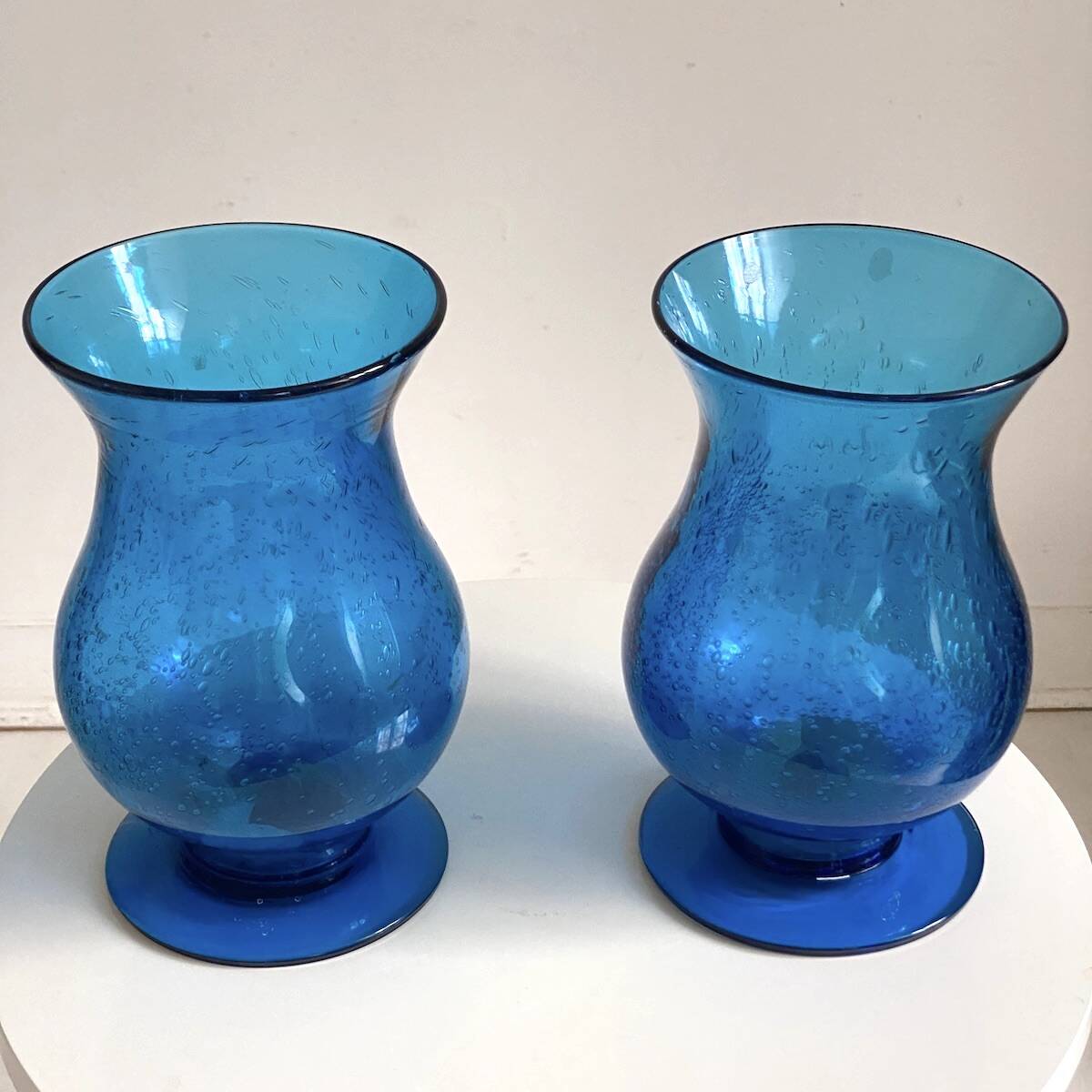 Pair of candle holders from the Biot glassworks, height 22 cm, diameter 15 cm.