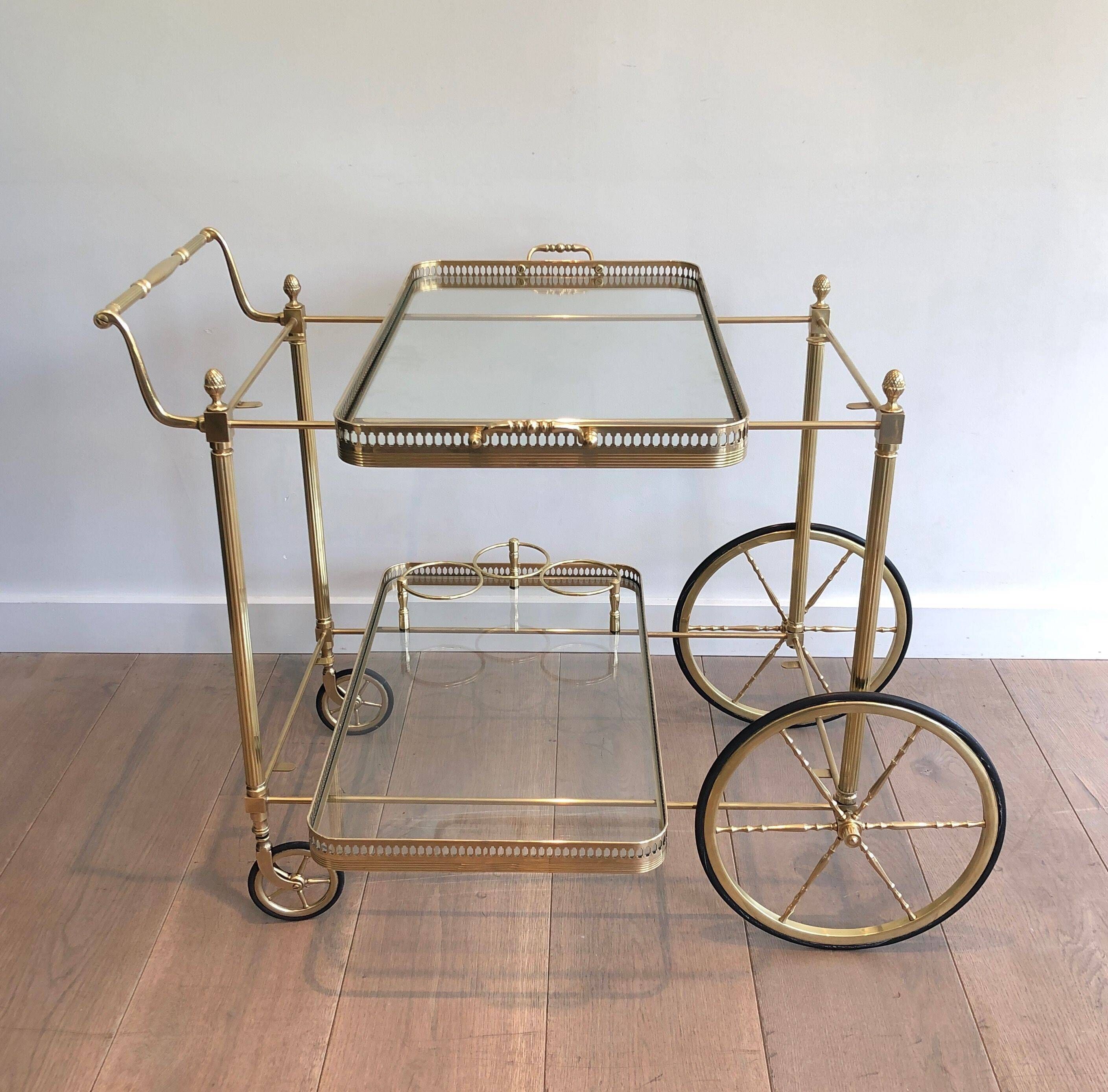 Brass rolling table with removable double trays from Maison Jansen.